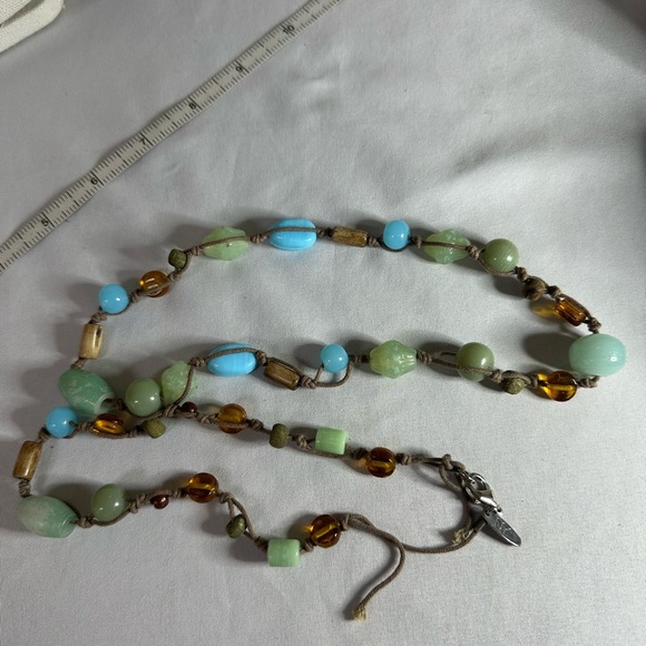 Boho cord necklace with sea glass vibes of blue and green beads - Picture 5 of 5